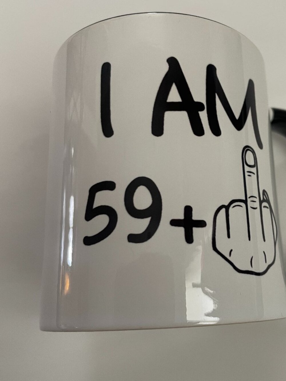 “I Am 59+” Middle Finger Coffee Mug